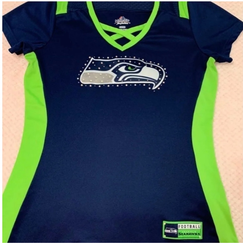 Woman’s size Medium Rate majestic tee with rhinestone’s .